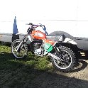 (02)
