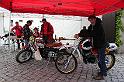 (09)